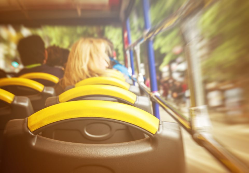 view from sightseeing bus from inside outside motion toning travel concept