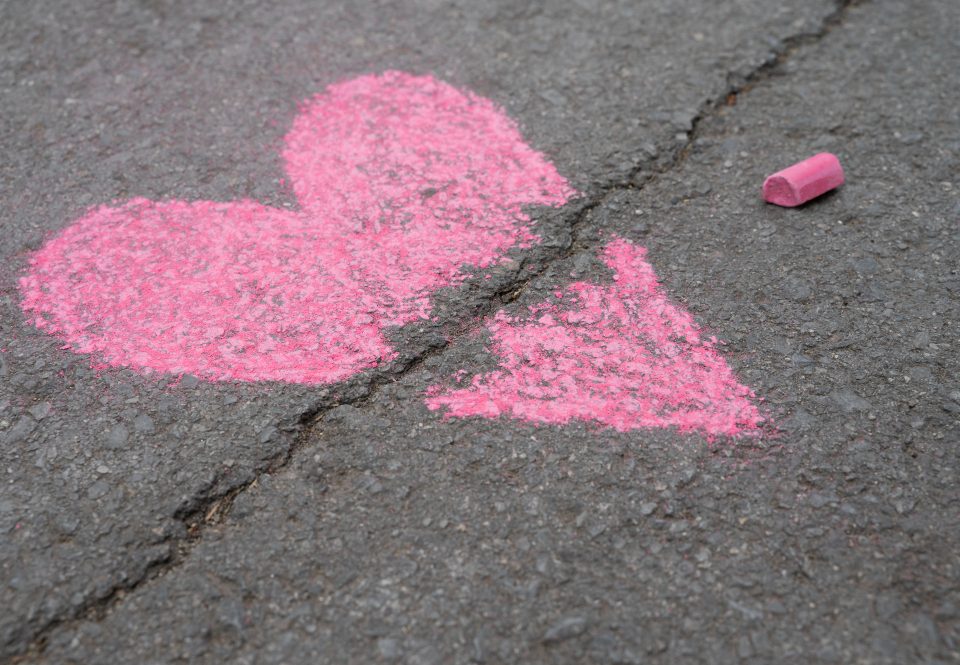 high angle broken chalk heart asphalt